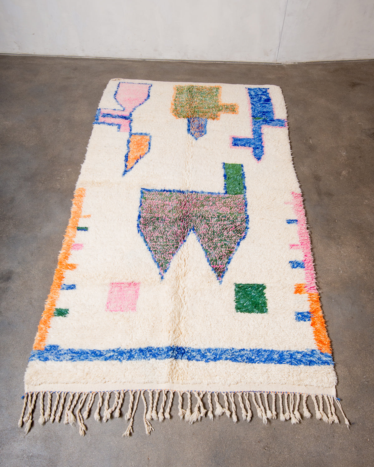 Modern, designer, handcrafted Berber rug from Morocco. Vintage carpet with beautiful colours and patterns and fluffy texture.